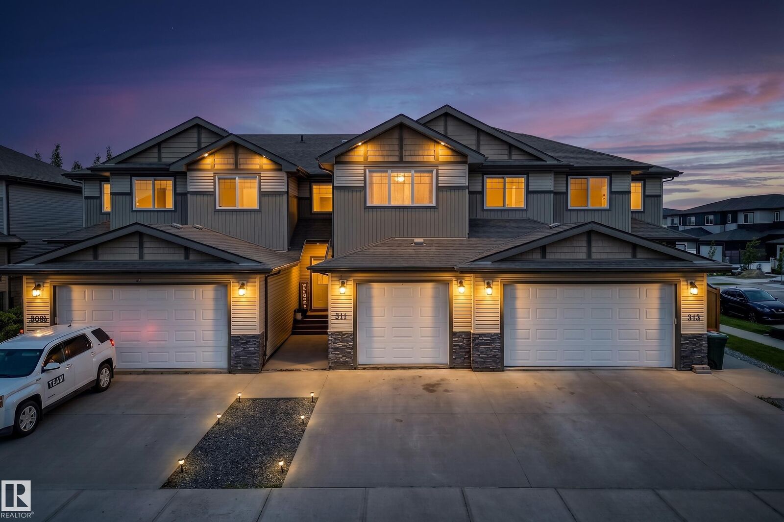 Property Photo:  311 Genesis Vi  AB T7Z 0J6 