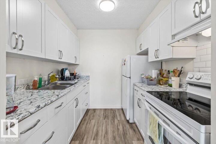 Property Photo:  8735 165 Street NW 107  AB T5R 2R6 