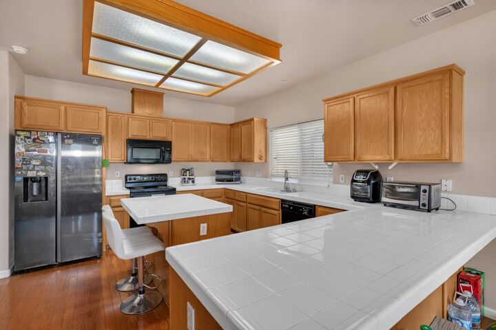 Property Photo:  7090 Emerald Street  CA 93610 