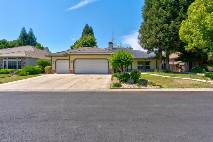 Property Photo:  7090 Emerald Street  CA 93610 