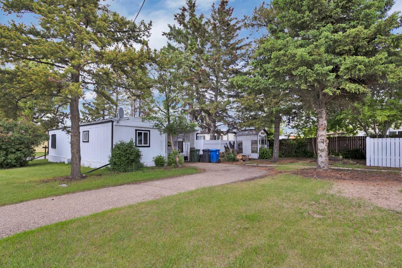 Property Photo:  4715 46 Street  AB T4G 1N9 