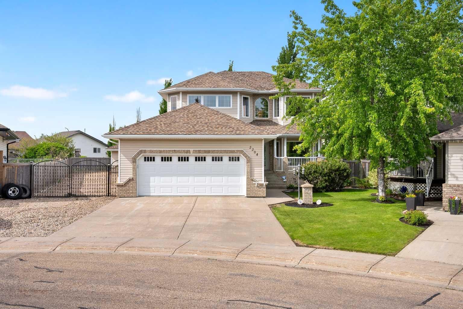 Property Photo: 2204 59A Avenue Close AB T9V 3J3