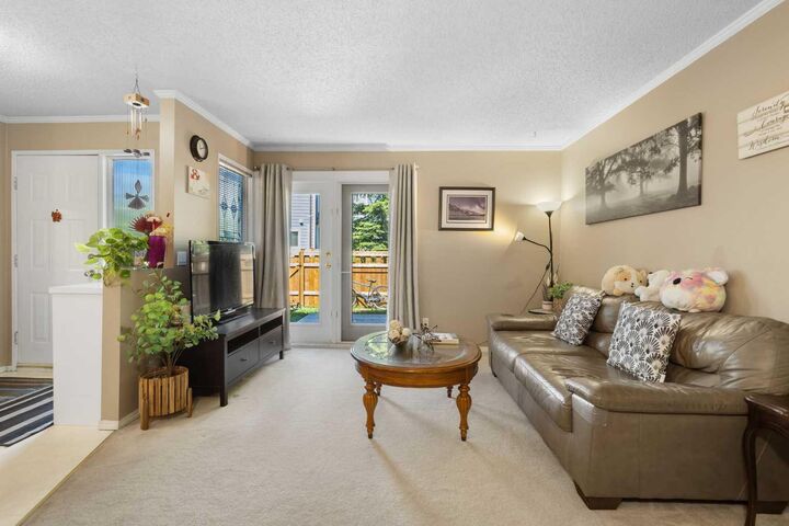 Property Photo:  203 Grier Terrace NE 4  AB T2K 5Y7 