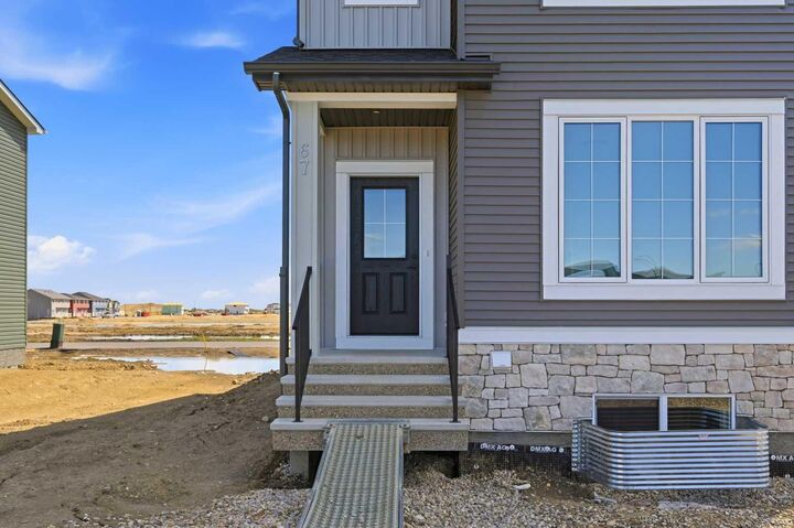 Property Photo: 67 Huxland Road AB T2A 6Z7