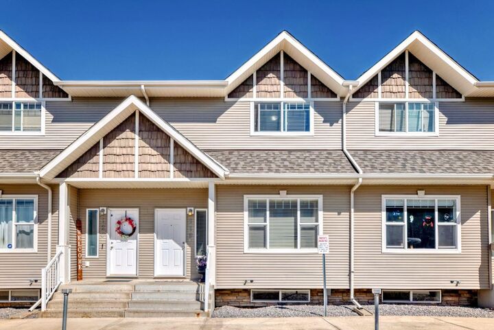 Property Photo: 50 Lucky Place 119 AB T4S 0E3