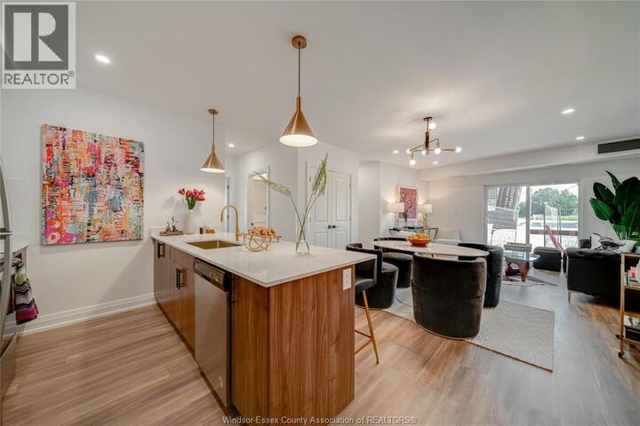 Property Photo:  11957 Tecumseh Road East 303  ON N8R 1L0 