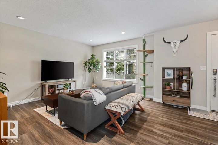 Property Photo:  9535 217 Street NW 77  AB T5T 4P5 