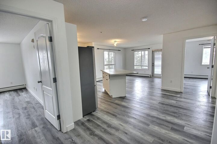 Property Photo:  111 Edwards Drive SW 222  AB T6X 0C4 