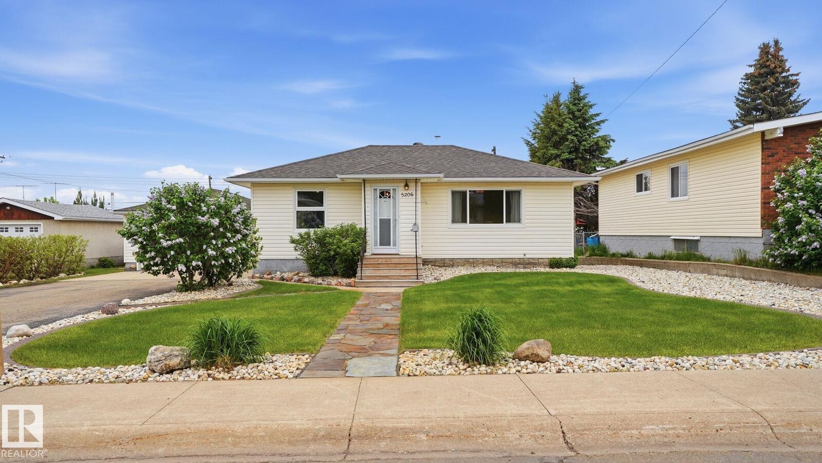 Property Photo:  5206 45 Avenue  AB T9C 1A2 