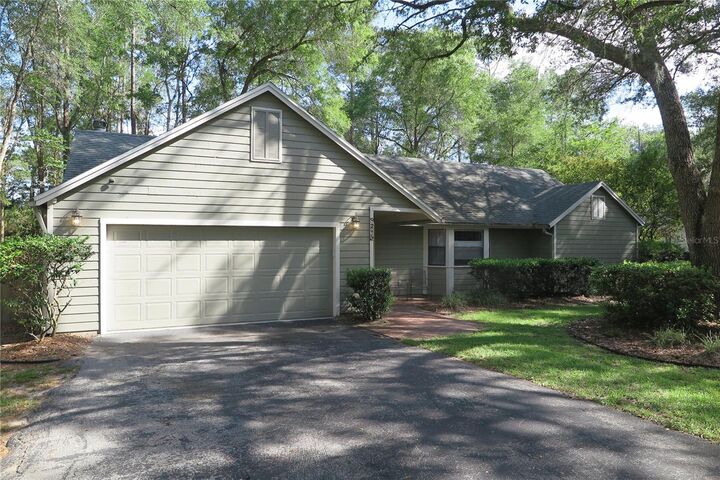 Property Photo:  8215 SW 47th Road  FL 32608 