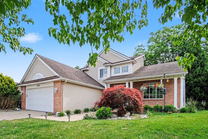 Property Photo:  4699 Raintree Drive SE  MI 49512 