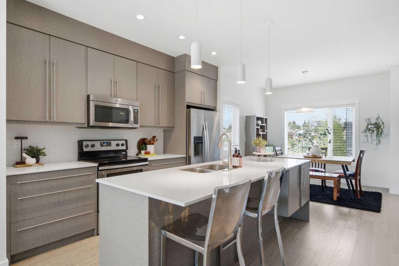 Property Photo:  5305 32 Avenue SW 2101  AB T3E 8A2 