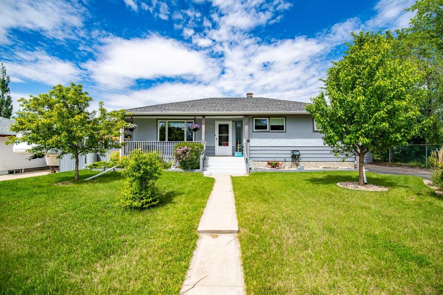 Property Photo:  5024 43 Street  AB T4G 1K2 