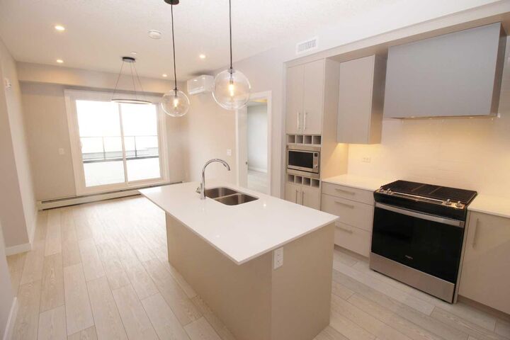 Property Photo:  8370 Broadcast Avenue SW 214  AB T3H 6L3 