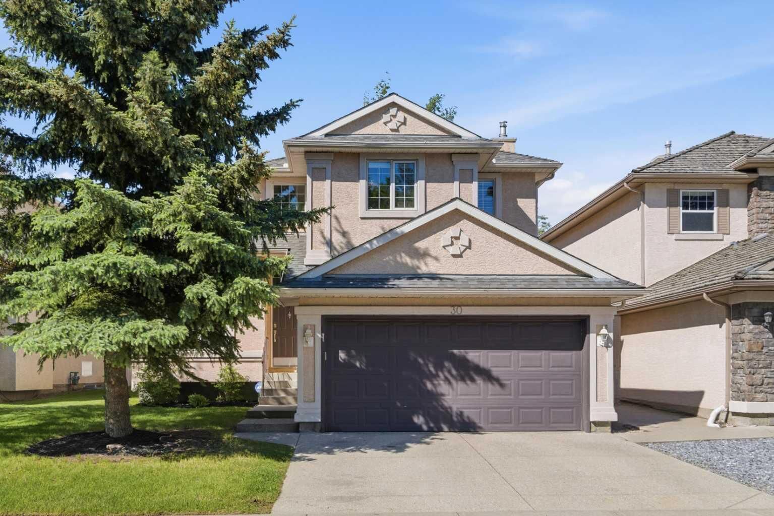 Property Photo: 30 Mt Yamnuska Court SE AB T2Z 2Z6
