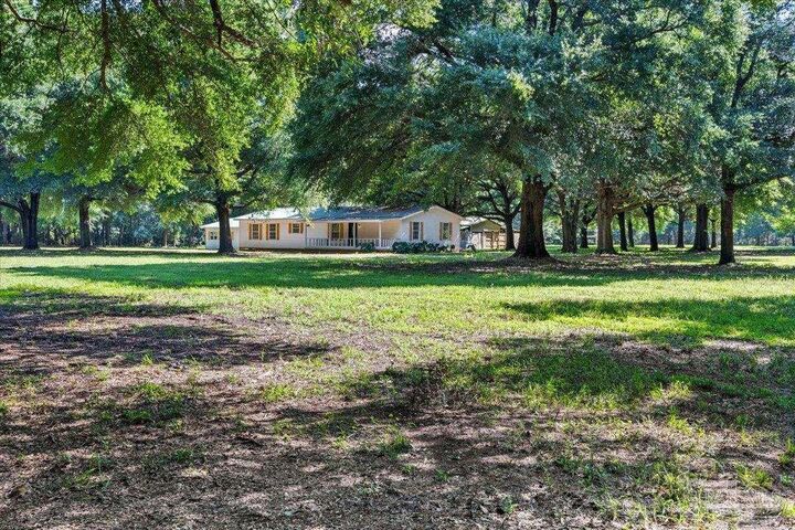 Property Photo:  12400 Wildlife Rd  FL 32564 