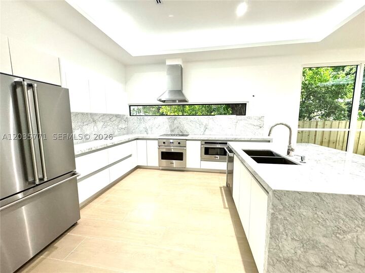 Property Photo: 5728 NW 5th Ct Th-1 FL 33127