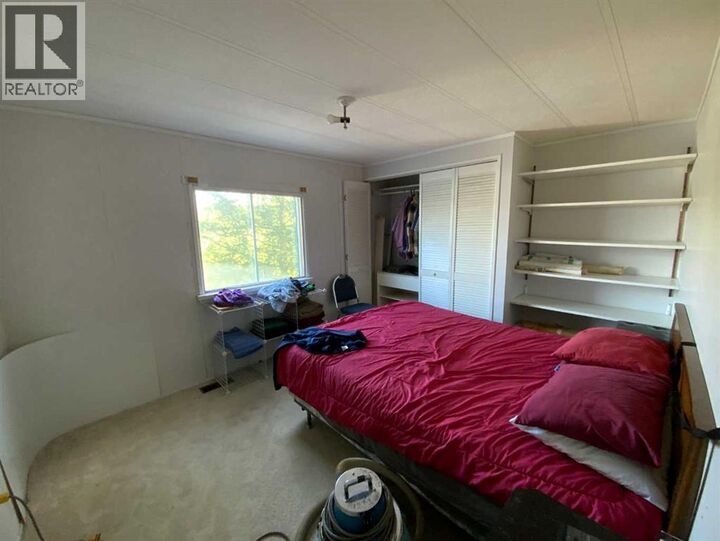 Property Photo:  48 Mobile Drive Northeast  AB T0M 2A0 