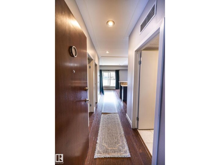 Property Photo:  #207 9750 94 St NW  AB T6C 2E3 