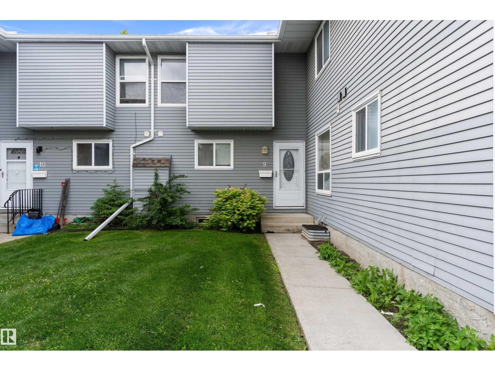 Property Photo:  #9 4403 Riverbend Rd NW  AB T6H 5S9 