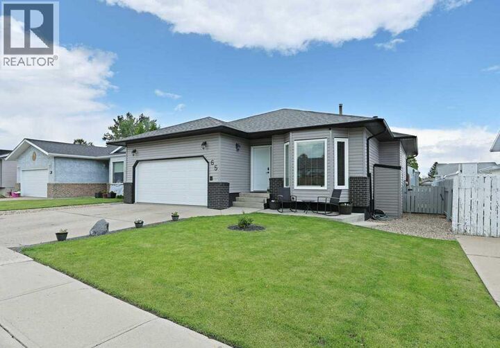 Property Photo: 65 Parkland Way East AB T1R 0M6