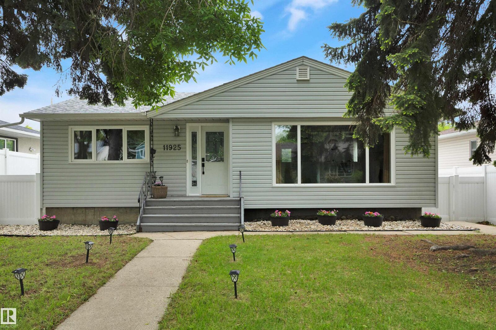 Property Photo: 11925 37 Street NW AB T5W 2B9