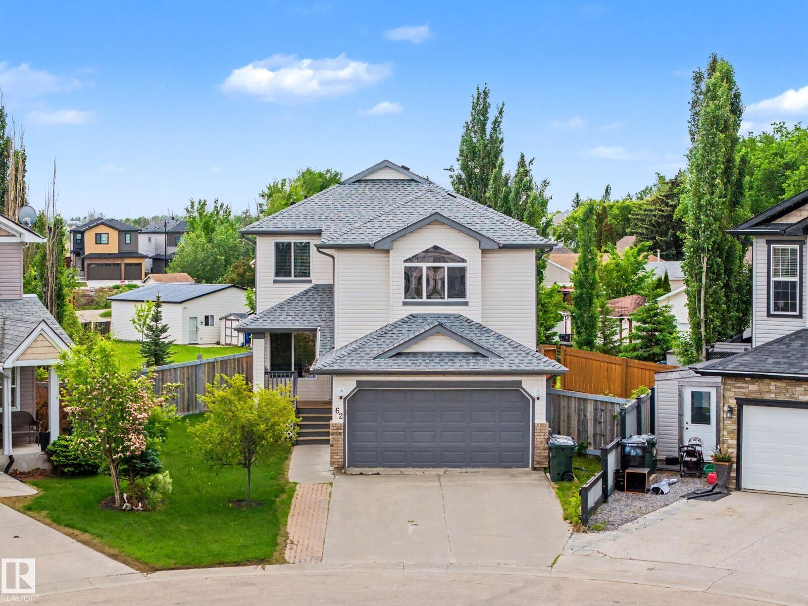 Property Photo:  62 Greystone Crescent  AB T7A 0A7 