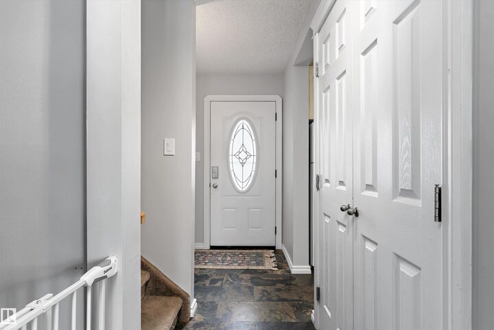 Property Photo: 4403 Riverbend Road NW 9 AB T6H 5S9