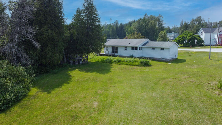 Property Photo:  409 S Superior St  MI 49725 