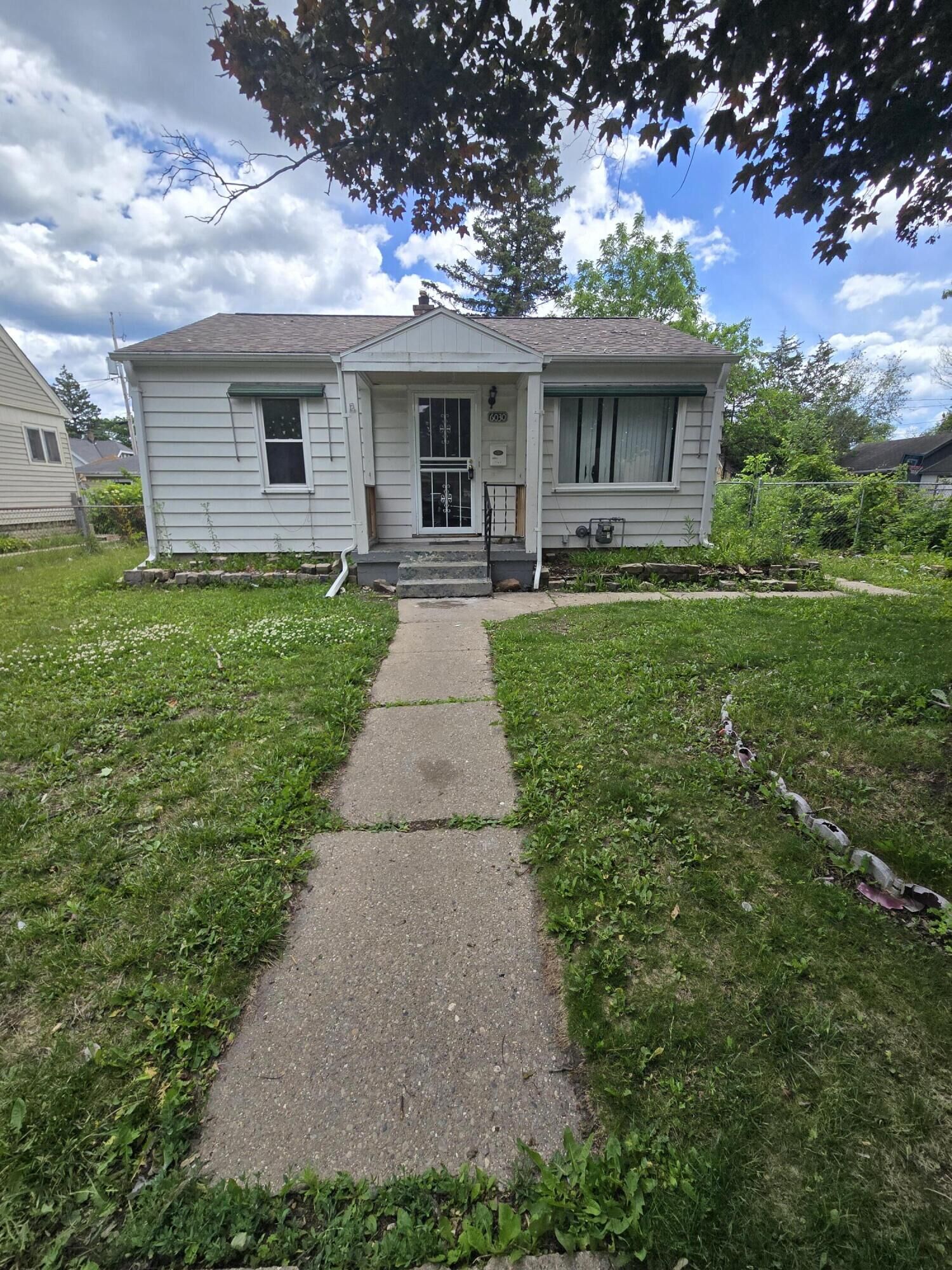 Property Photo:  6030 N 36th St  WI 53209 