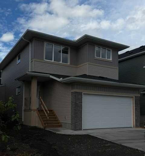 Property Photo: 423 Rivercrest Road AB T4C 3C6