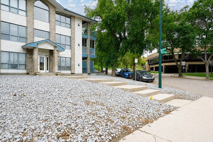 Property Photo:  407 Macleod Trail SE 4  AB T1A 8P7 