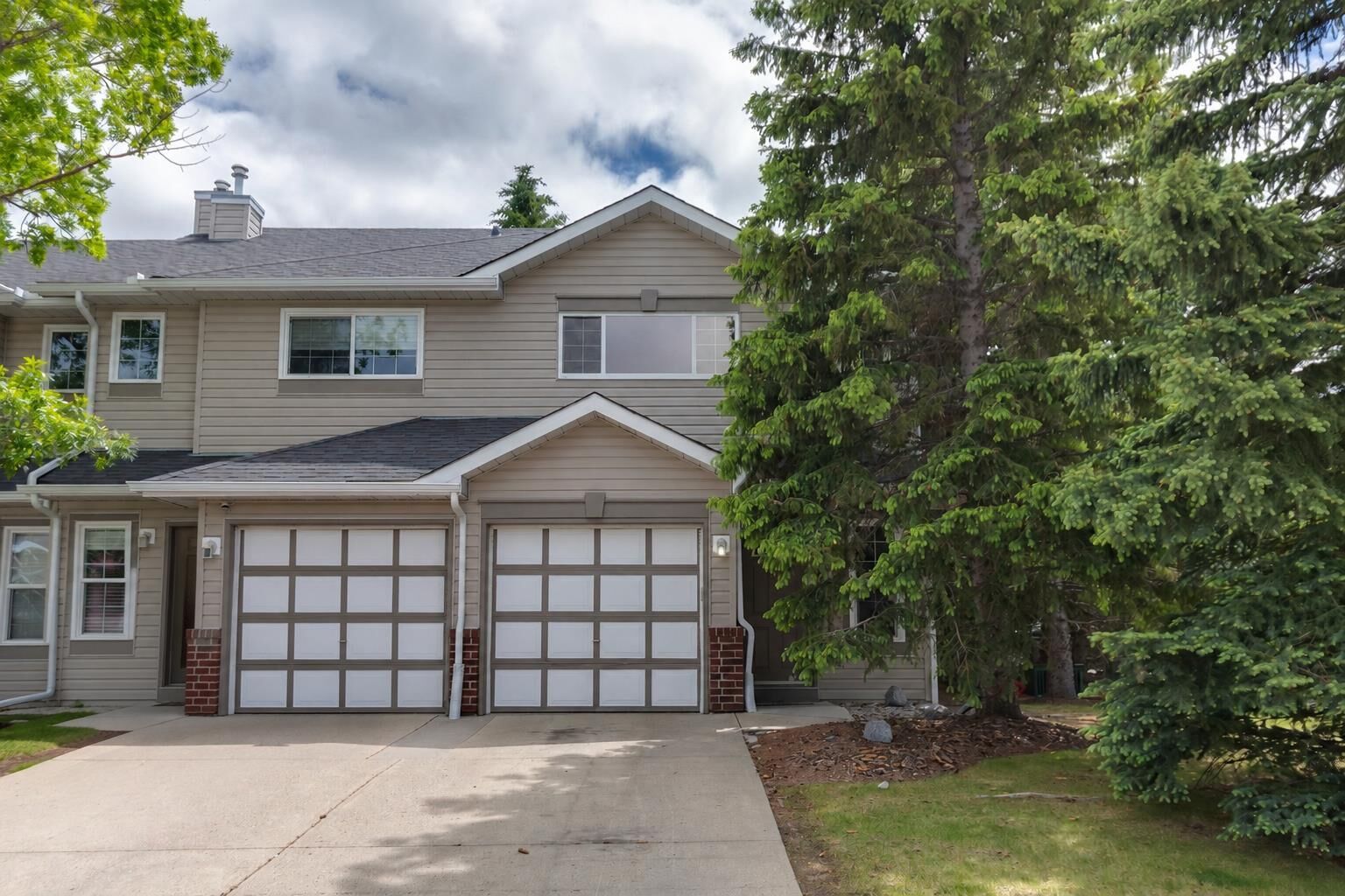 Property Photo: 902 Harvest Hills Drive NE AB T3K 4L3