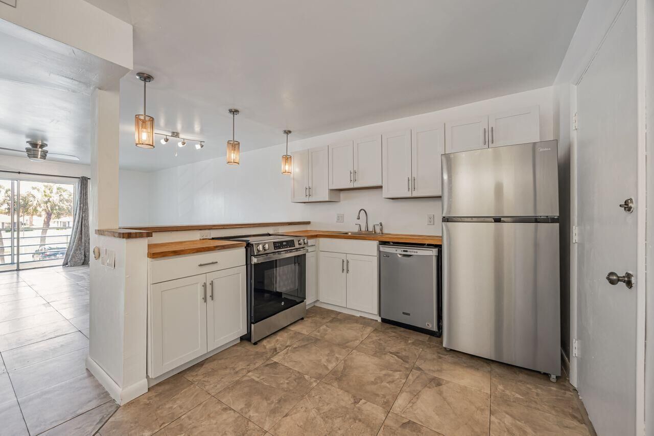 Property Photo:  22605 SW 66th Avenue 206  FL 33428 