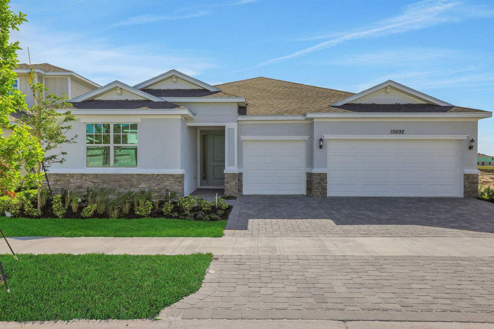 Property Photo:  10717 NW Suncrest Lp  FL 34987 