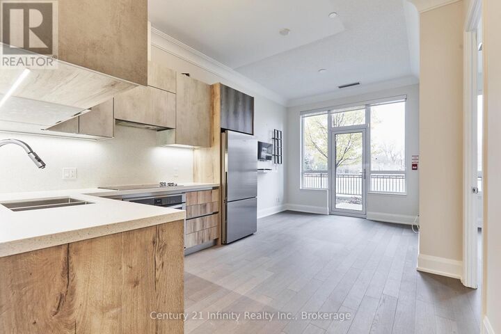 Property Photo: 25 Water Walk Drive 115 ON L6G 0G3