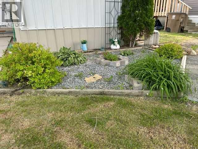 Property Photo: 56 Greenbrook Village East AB T1R 0R7