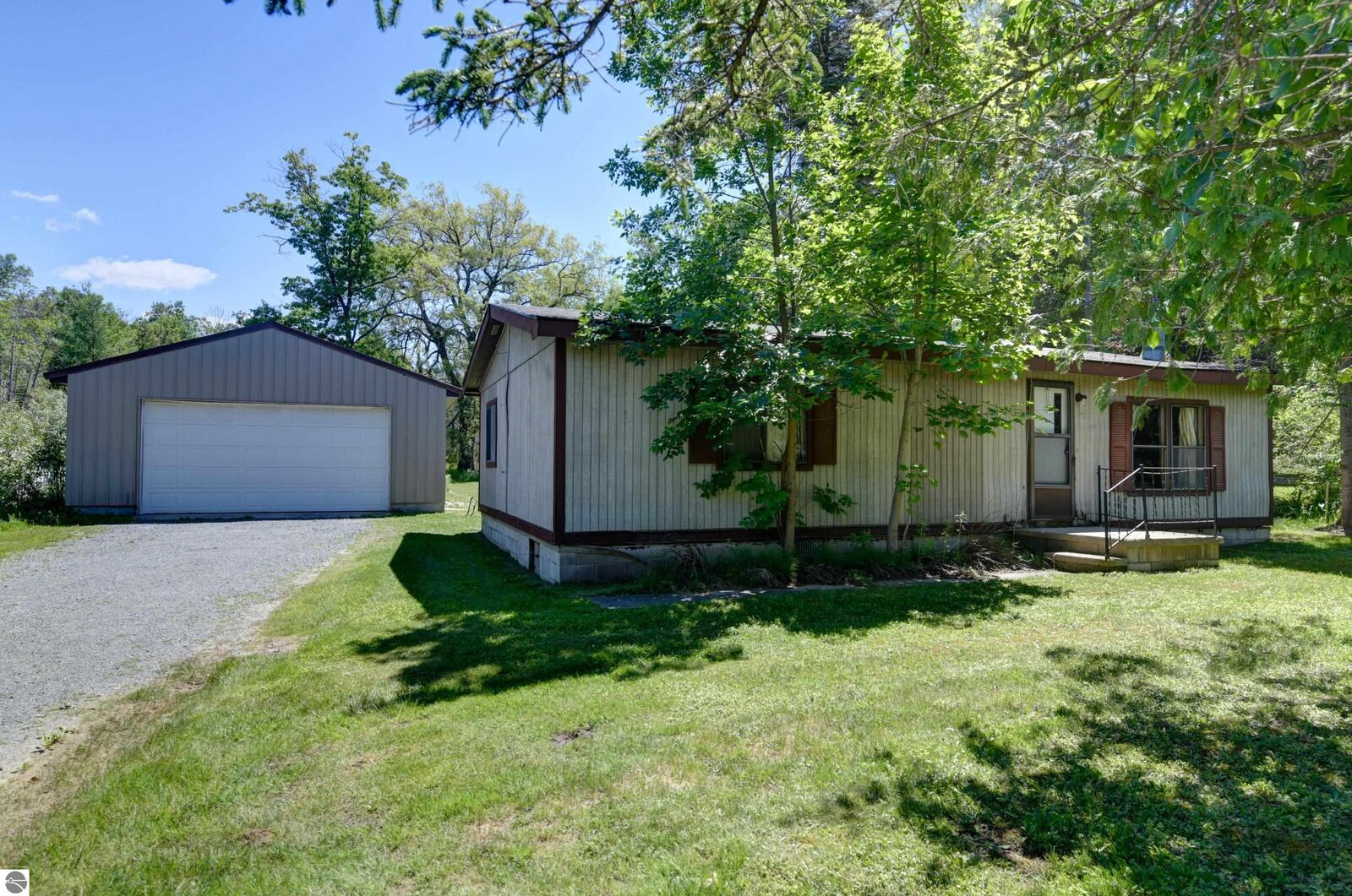 Property Photo:  2576 N Four Mile Road  MI 49686 