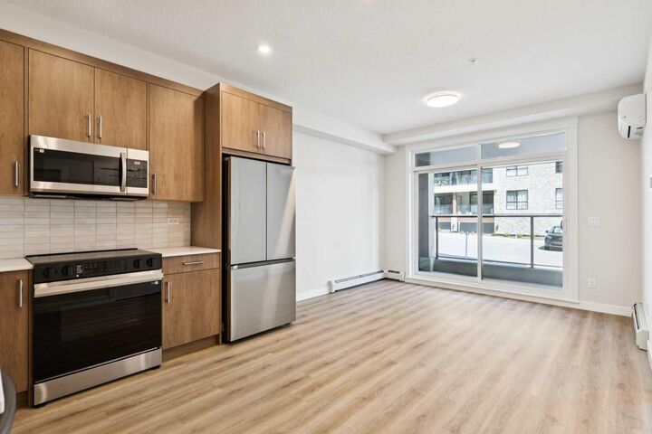 Property Photo: 1802 Mahogany Boulevard SE 6103 AB T3M 4A5