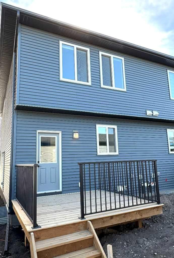 Property Photo: 311 Wolf River Drive SE AB T2X 6G6