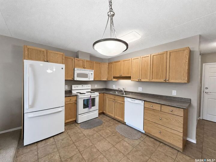 Property Photo: 1901 1 1/2 Avenue W 202 SK S6V 5A8