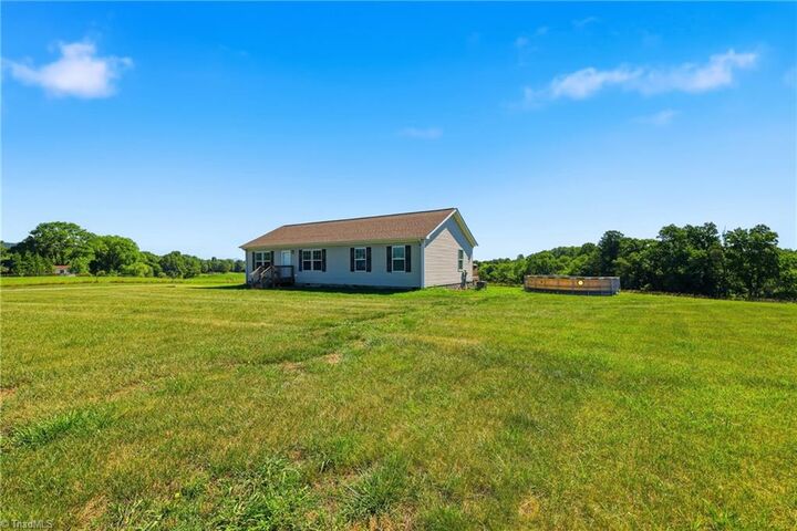 Property Photo:  112 Mining Ridge Church Road  NC 28621 