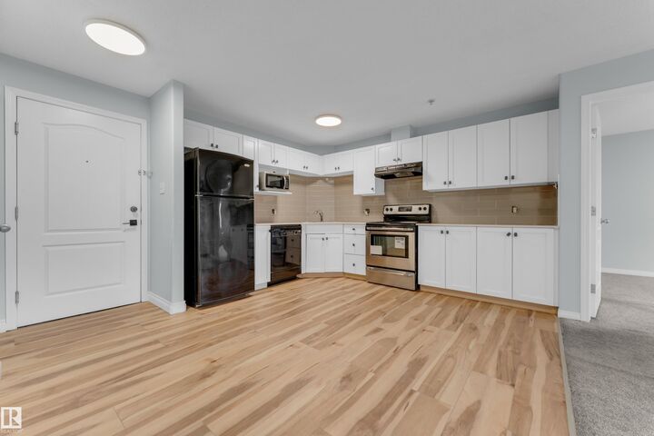 Property Photo: 111 Edwards Drive SW 326 AB T6X 0C4