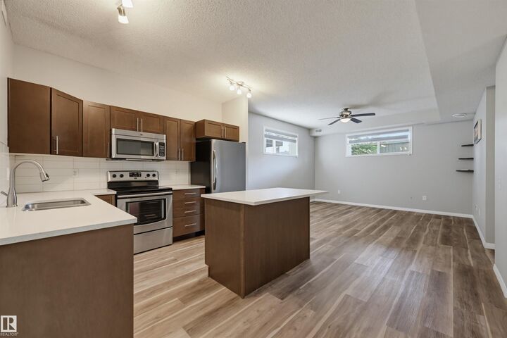 Property Photo: 6520 2 Avenue SW 23 AB T6X 0B5