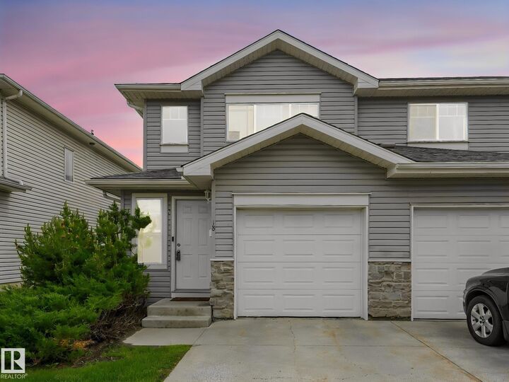 Property Photo: 230 Edwards Drive SW 18 AB T6X 1G7