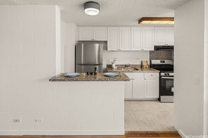 Property Photo:  647 Kunawai Lane C614  HI 96817 