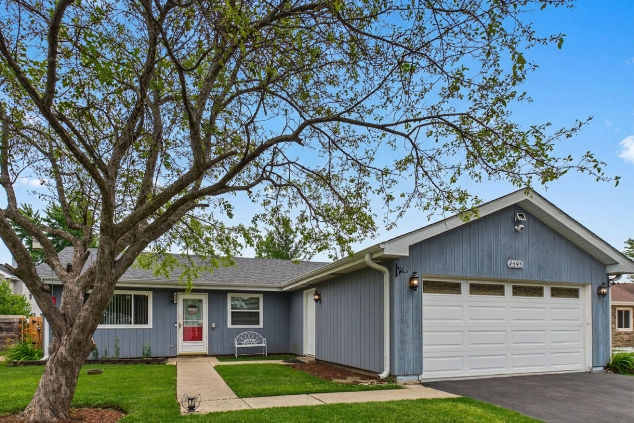 Property Photo:  4595 Zeppelin Drive  IL 60133 