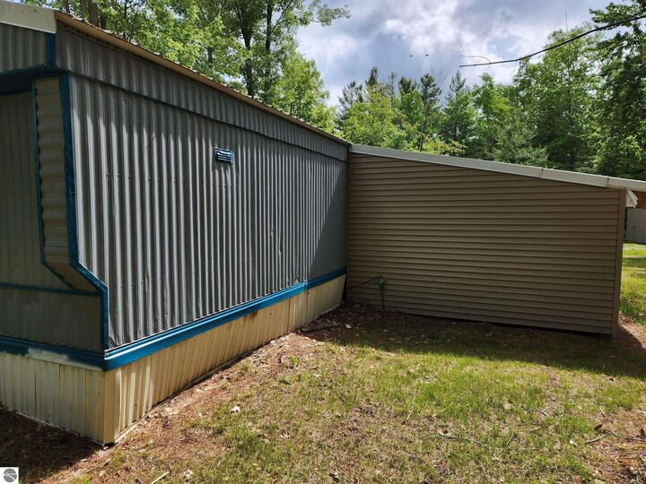 Property Photo: 5446 Blue Lake Road, NE MI 49646