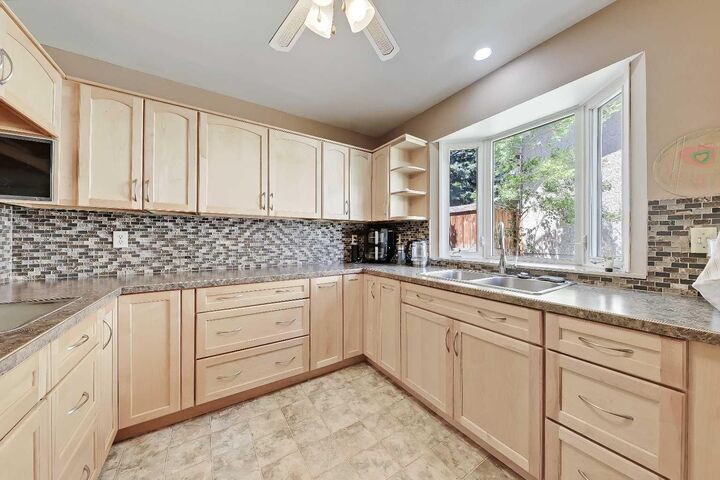 Property Photo: 4315 Charleswood Drive NW AB T2L 2E3