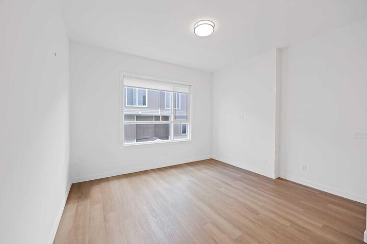 Property Photo:  101 Panatella Square NW 209  AB T3K 2R9 